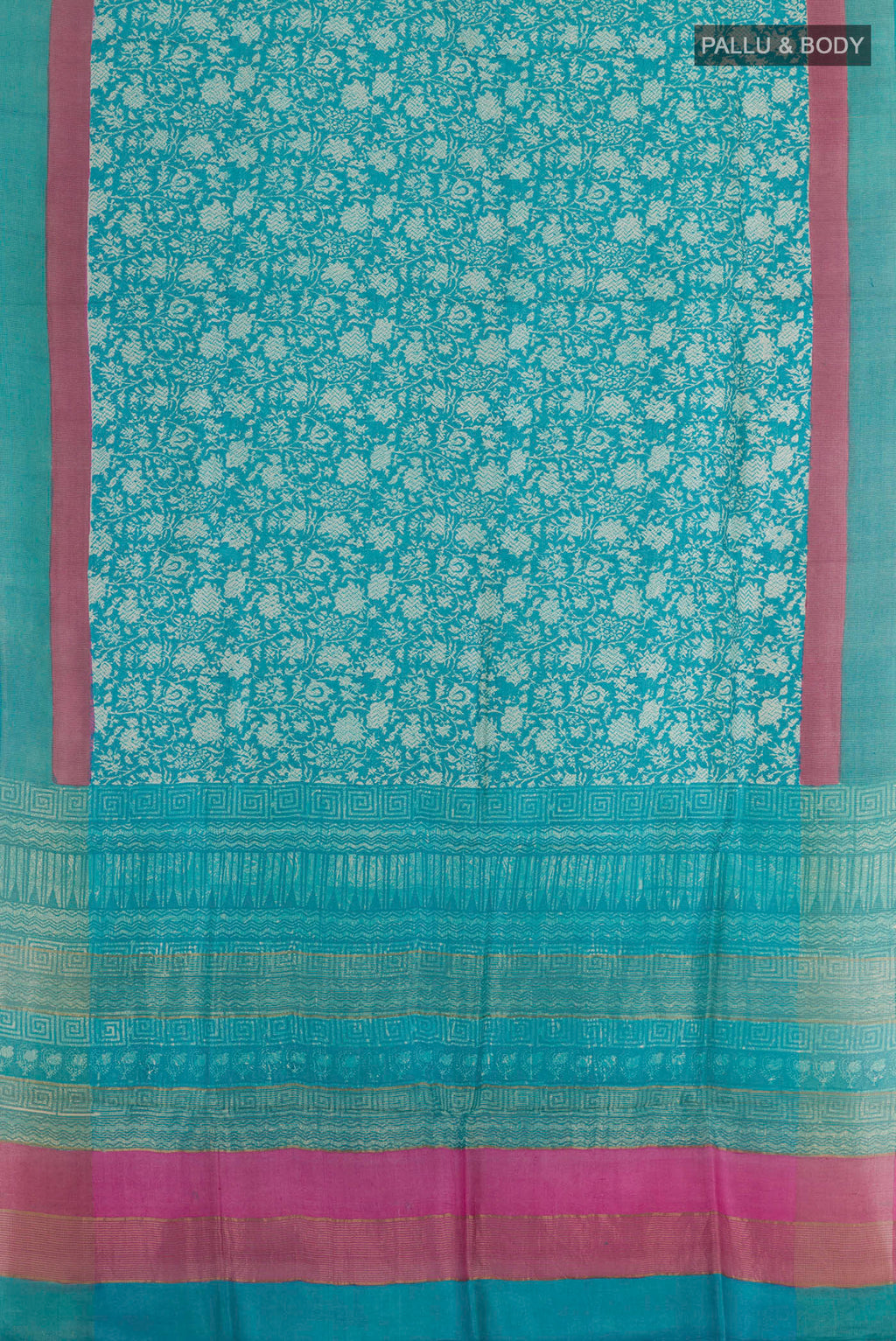 Flat view of Blue Tussar Silk Saree with Printed design on the body and Zari Border. 