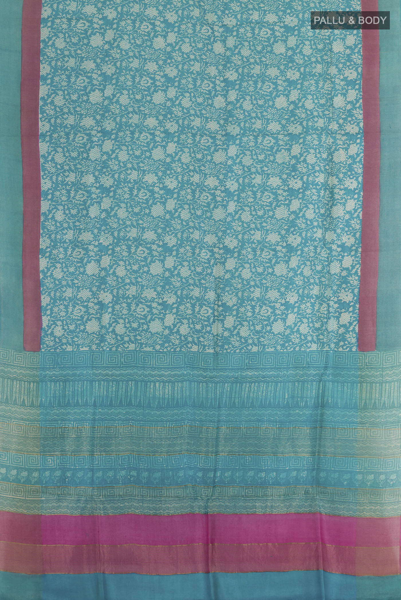 Flat view of Blue Tussar Silk Saree with Printed design on the body and Zari Border. 
