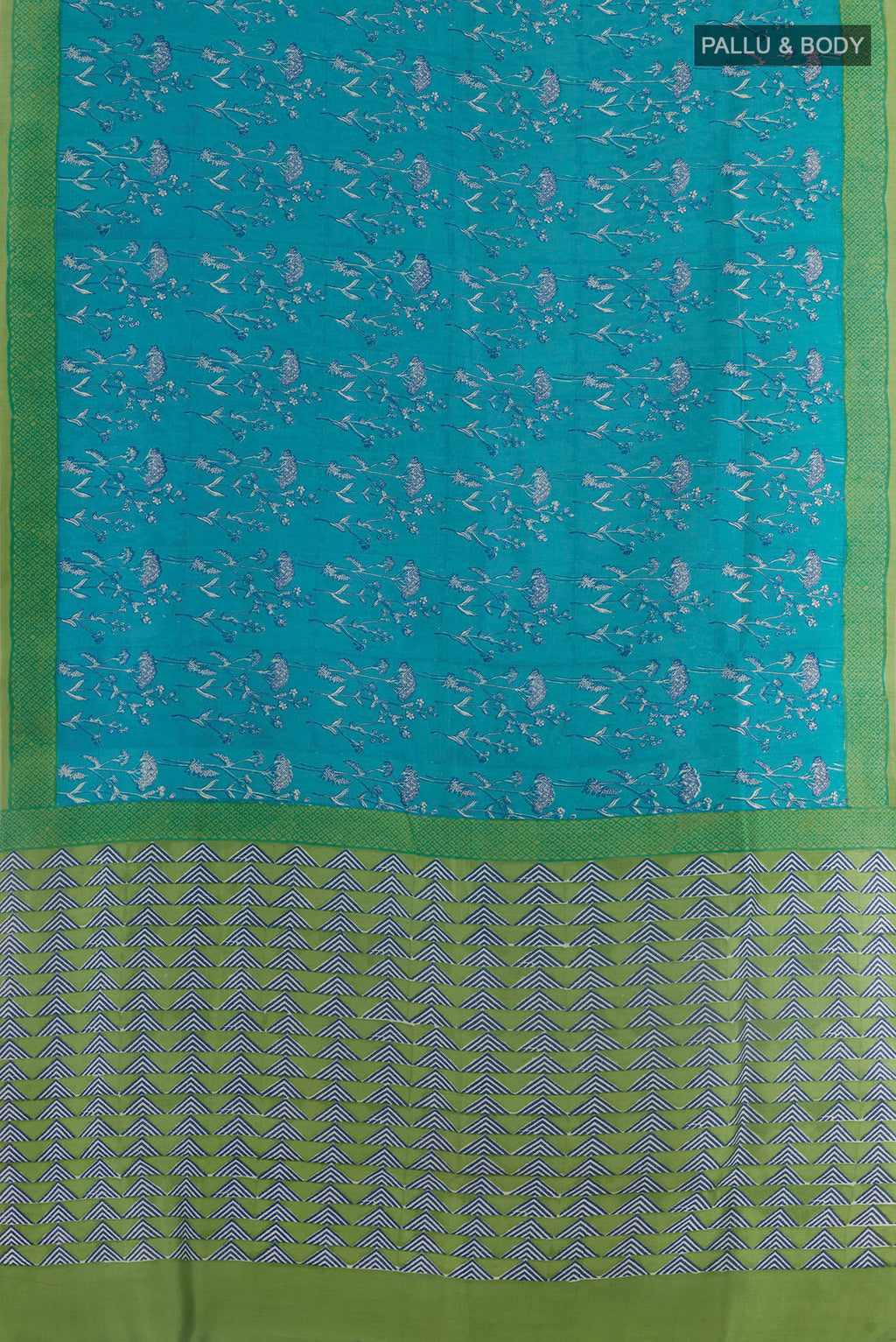 Flat view of Blue Tussar Silk Saree with Printed design on the body and Printed Border. 