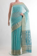 Light Blue Chanderi Silk Cotton Saree with Zari Butta on the body and Zari Border.  displayed on a mannequin