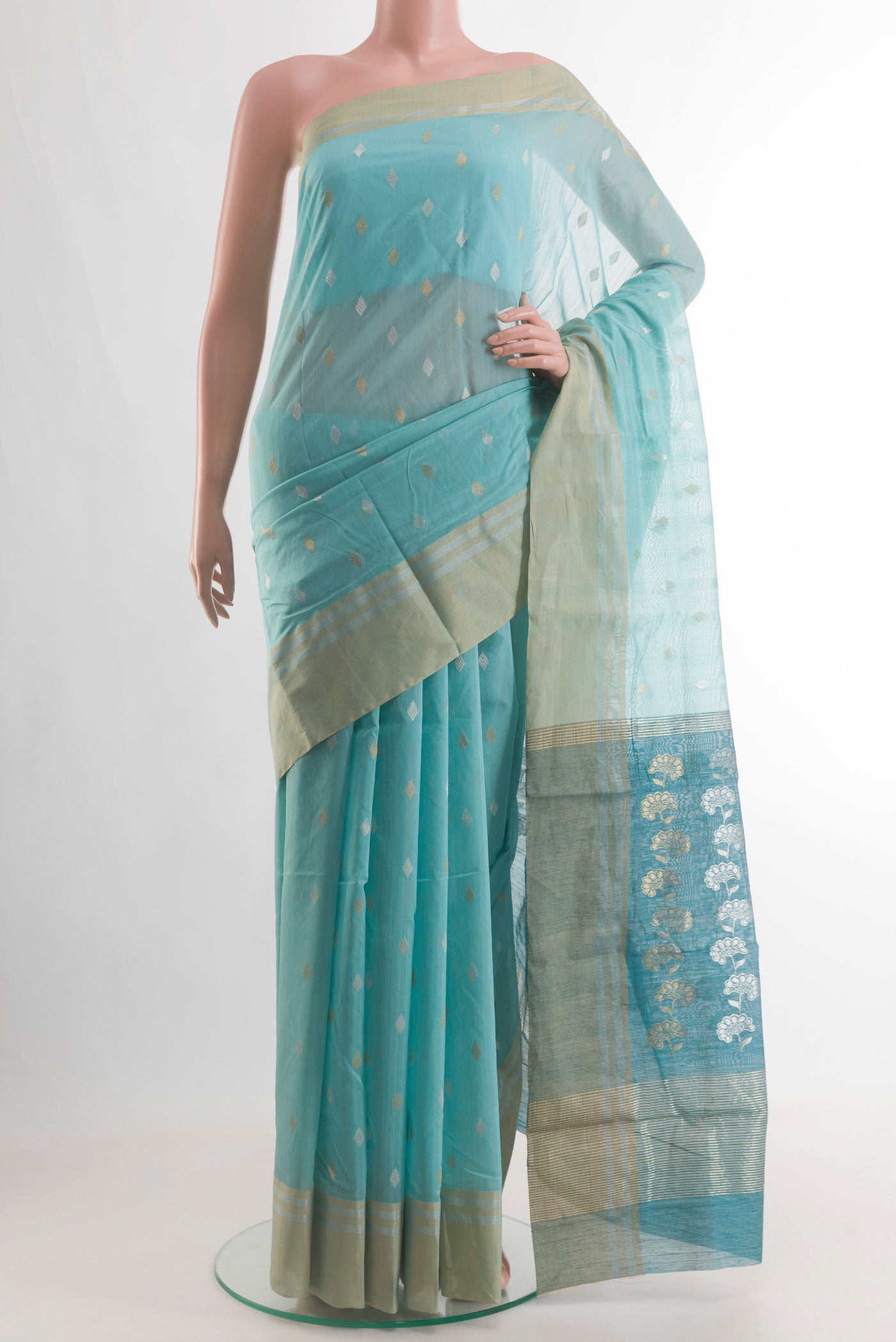 Light Blue Chanderi Silk Cotton Saree with Zari Butta on the body and Zari Border.  displayed on a mannequin