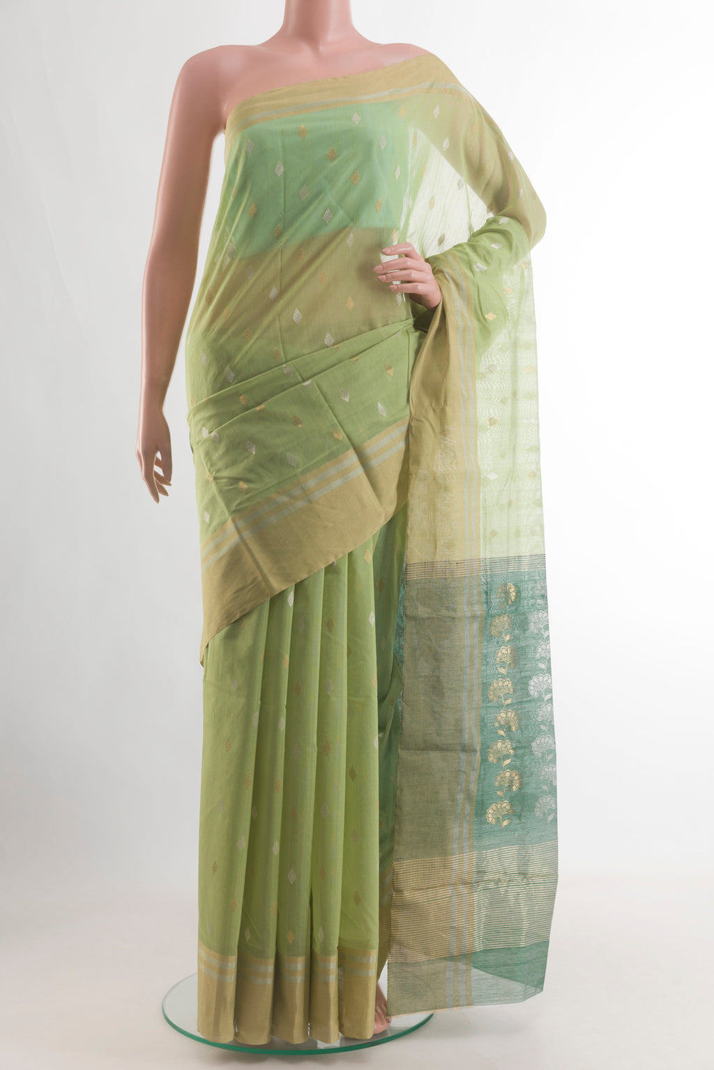 Light Green Blended Chanderi Silk Cotton Saree with Zari Butta on the body and Zari Border.  displayed on a mannequin