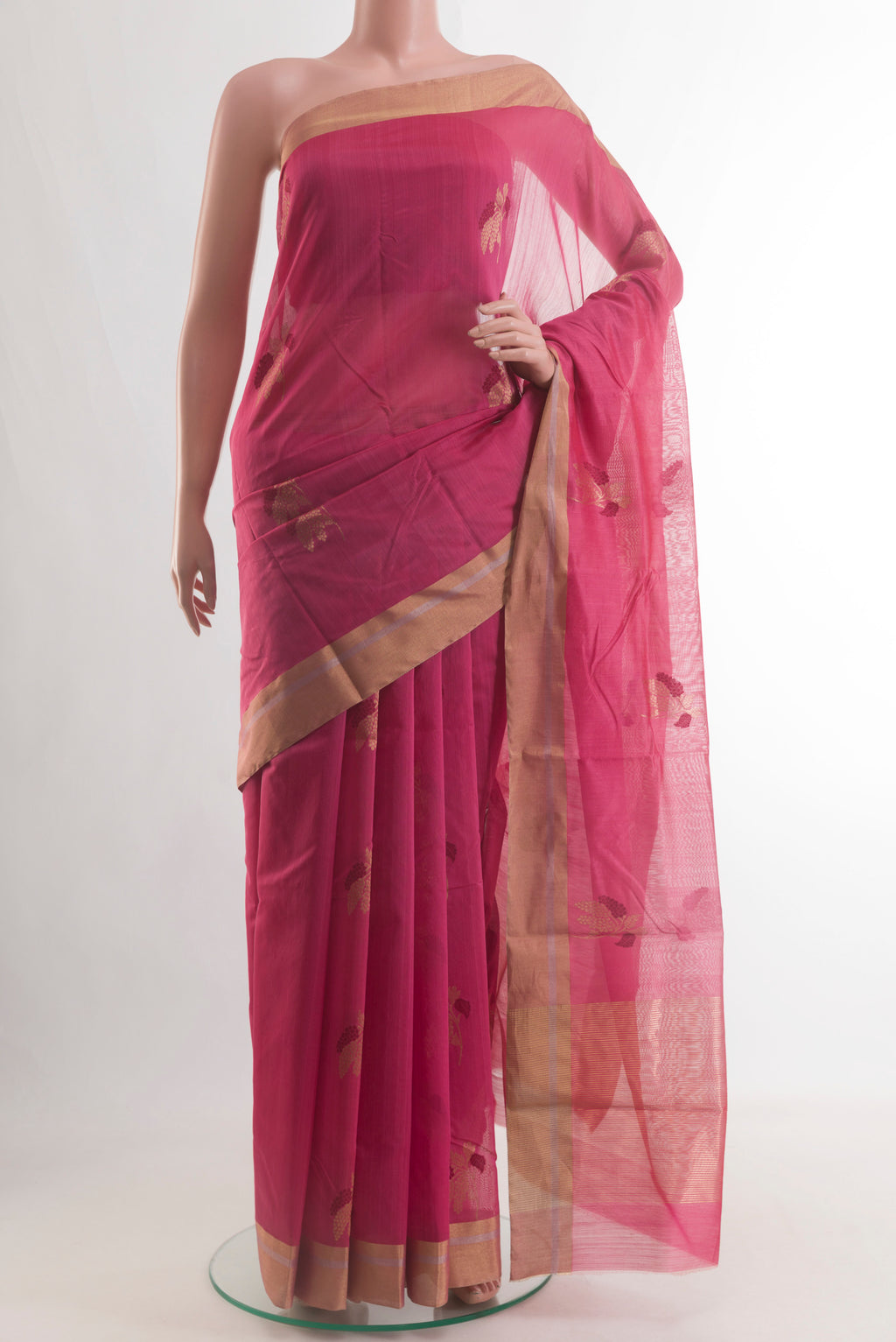 Pink Chanderi Silk Cotton Saree with Zari Butta on the body and Zari Border.  displayed on a mannequin