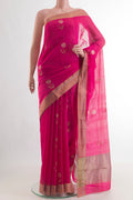 Pure Silk Pink Chanderi Cotton Saree with Zari Butta on the body and Zari Border.  displayed on a mannequin