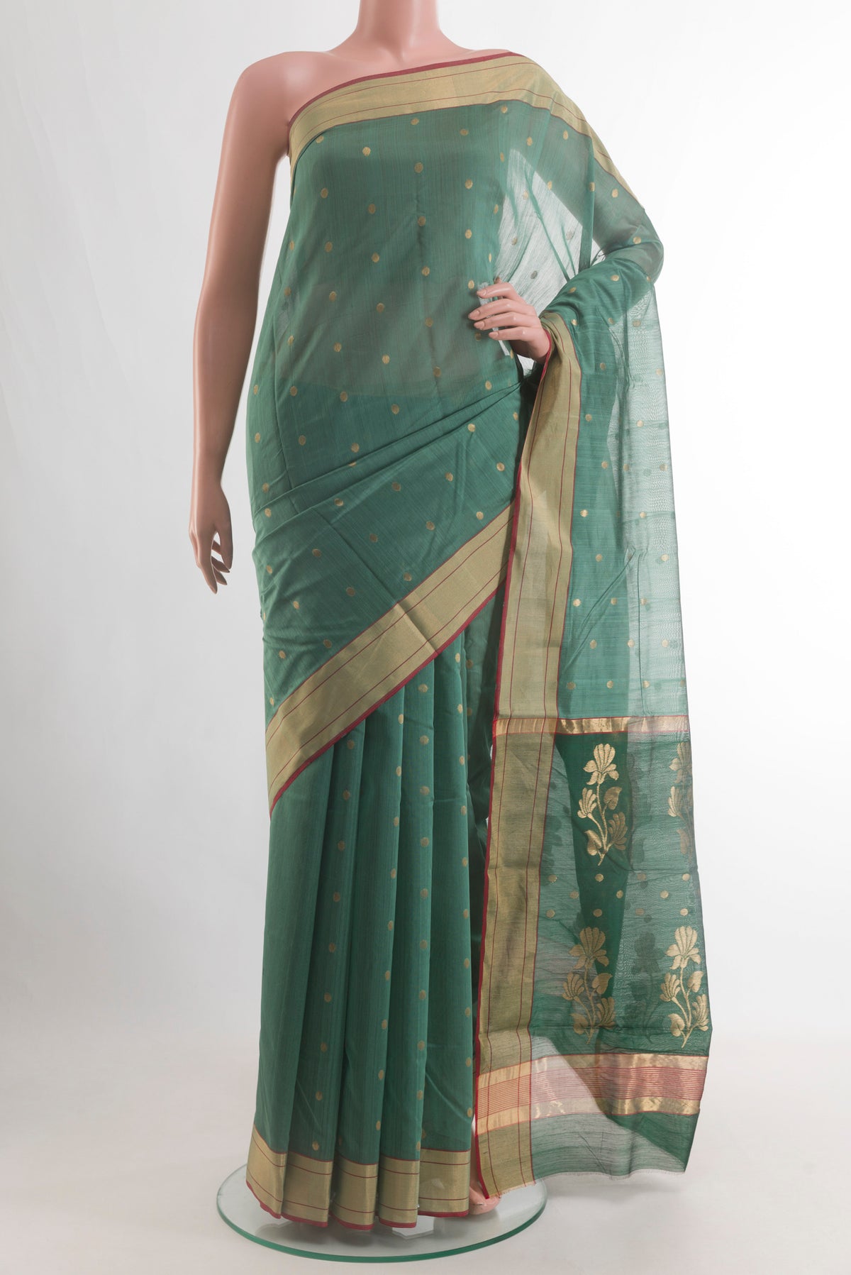 Pure Silk Green Chanderi Silk Cotton Saree with Zari Butta on the body and Zari Border.  displayed on a mannequin