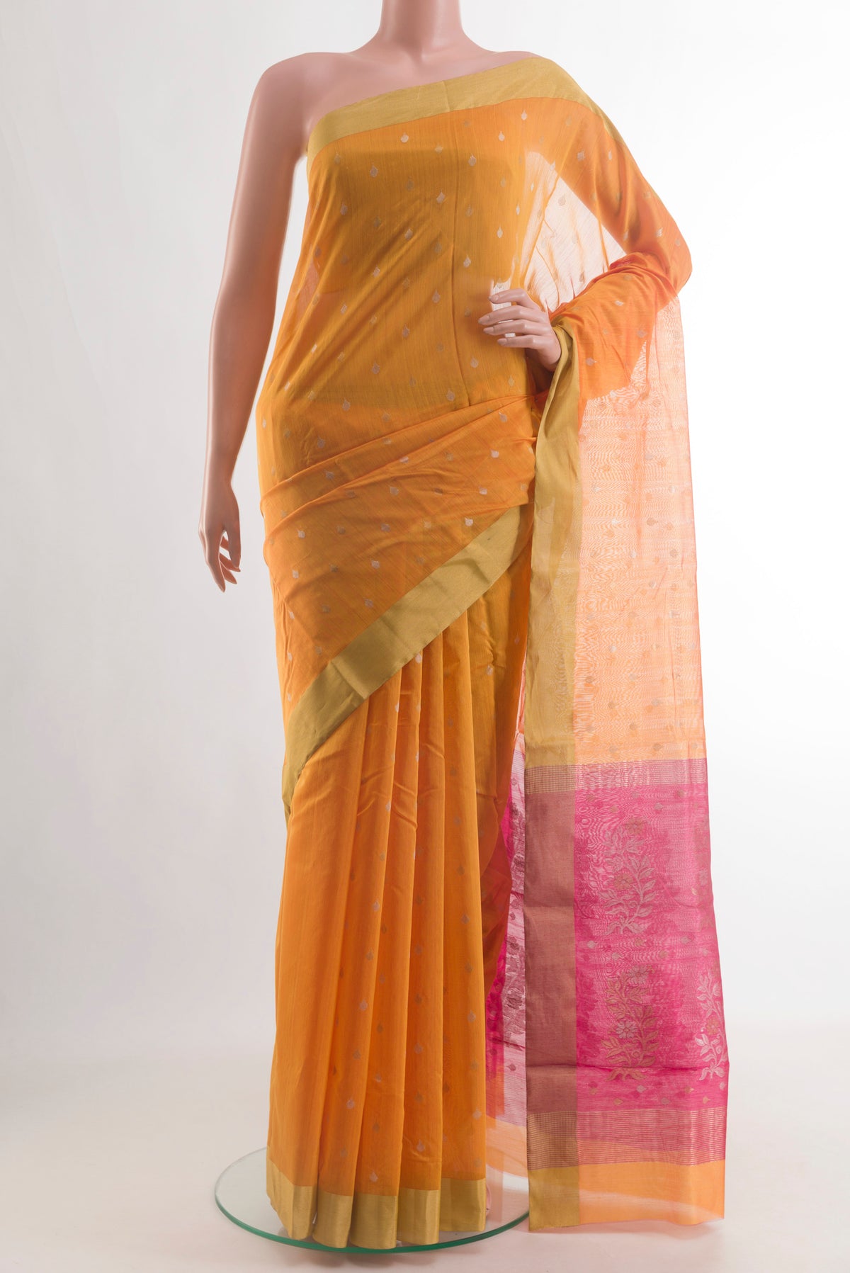 Yellow Chanderi Silk Cotton Saree with Zari Butta on the body and Zari Border.  displayed on a mannequin