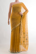 Mustard Chanderi Silk Cotton Saree with Zari And Thread Butta on the body and Zari Border.  displayed on a mannequin