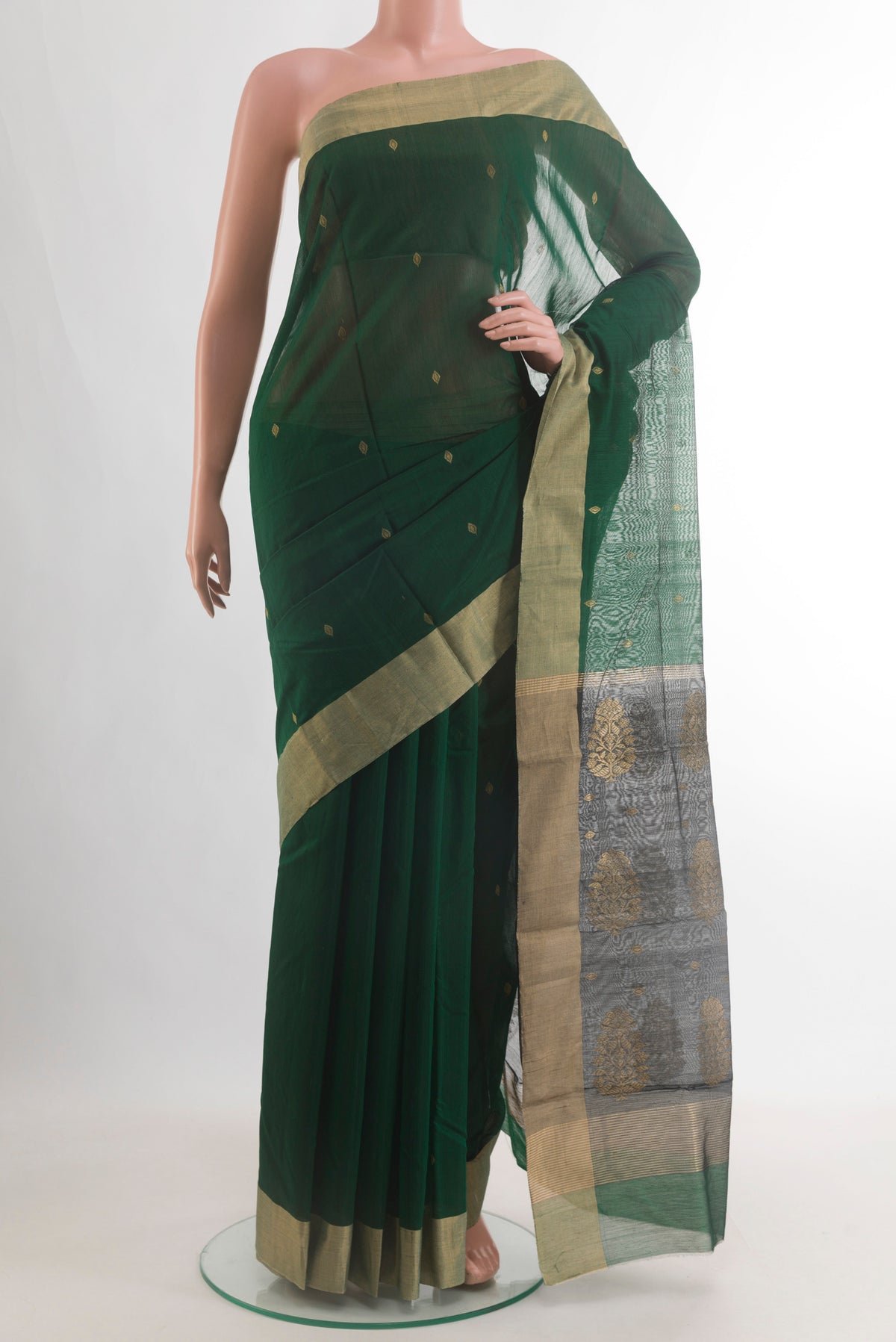 Bottle Green Chanderi Cotton Saree with Zari Butta on the body and Zari Border.  displayed on a mannequin
