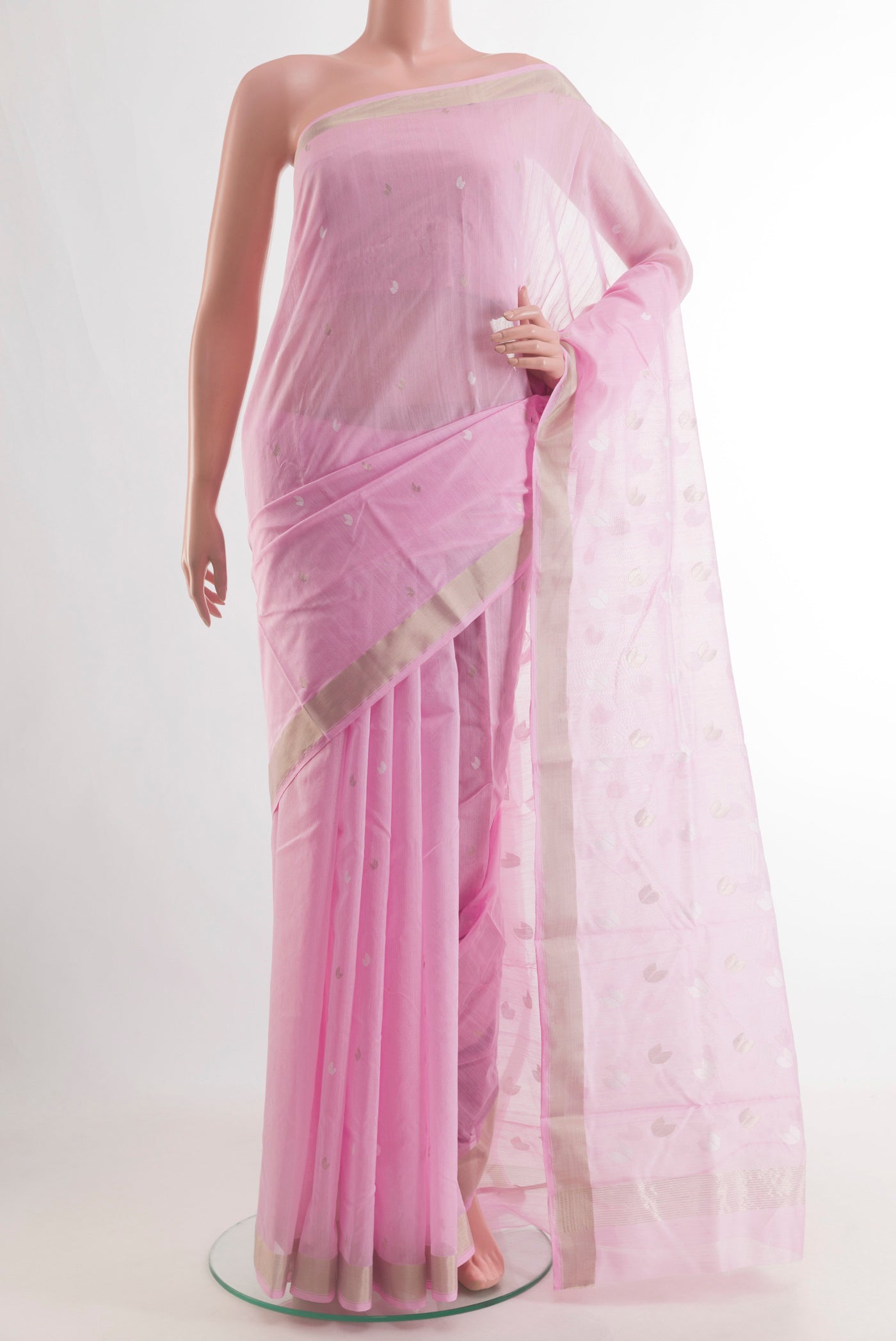 Pure Silk Rose pink Chanderi Cotton Saree with Zari Butta on the body and Zari Border.  displayed on a mannequin