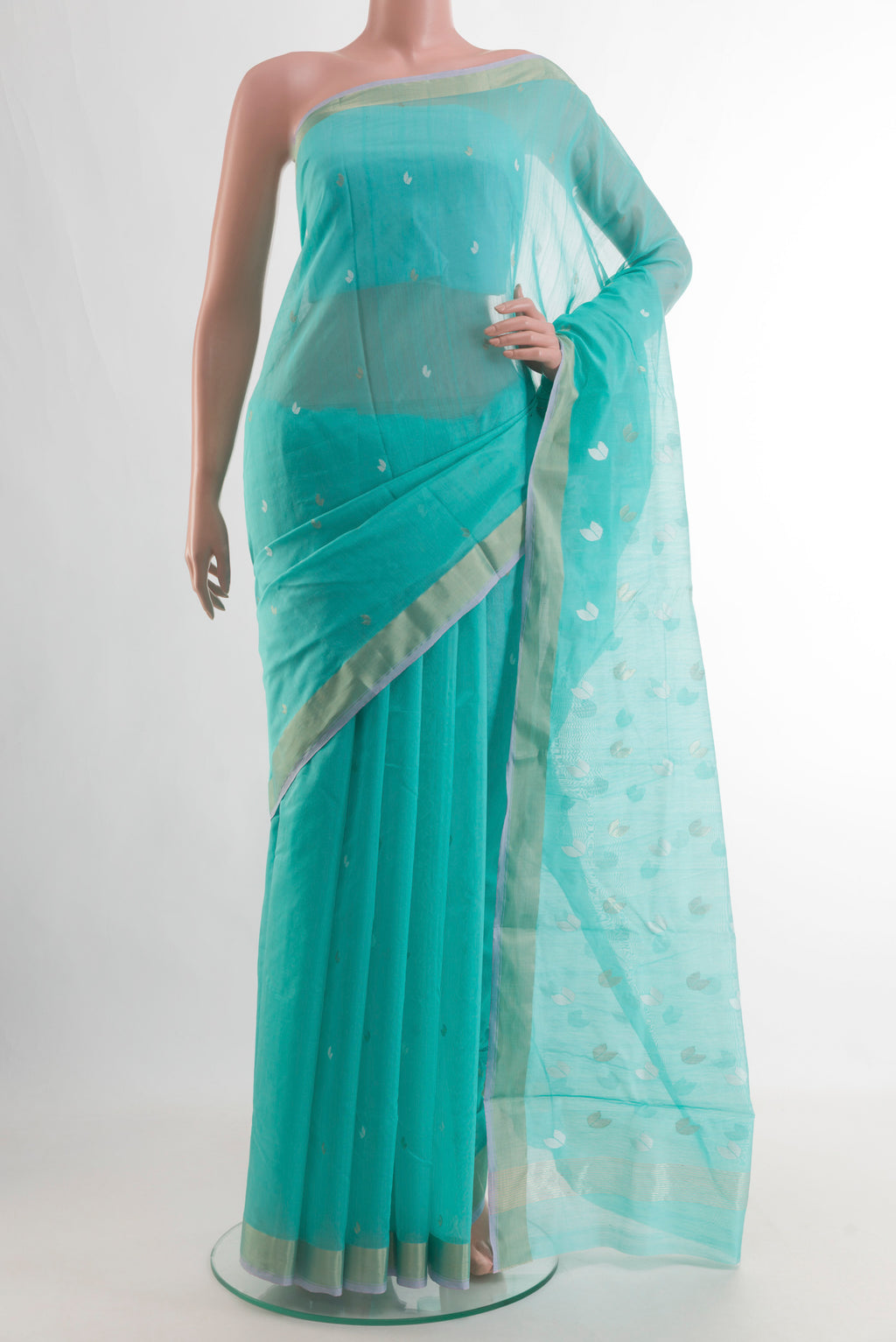 Pure Silk Sky Blue Chanderi Cotton Saree with Zari Butta on the body and Zari Border.  displayed on a mannequin