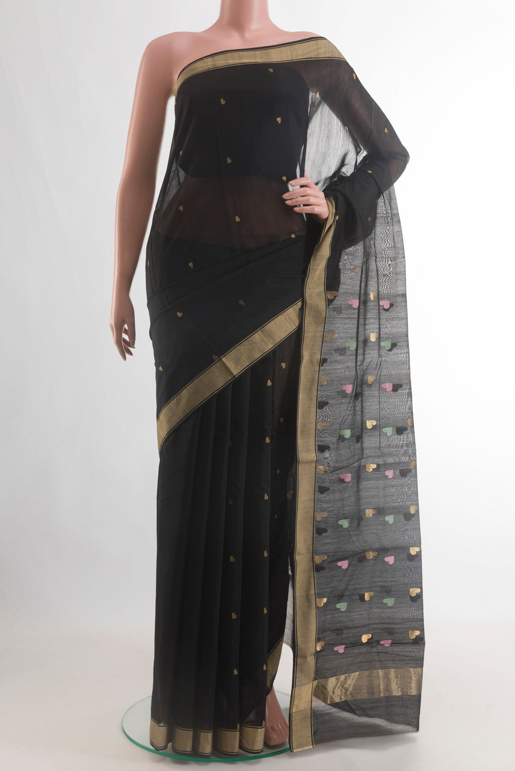 Pure Silk Black Chanderi Cotton Saree with Zari Butta on the body and Zari Border.  displayed on a mannequin