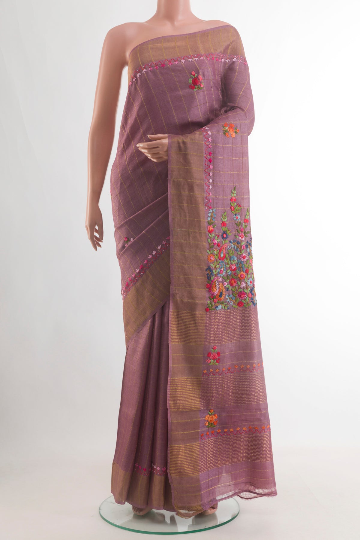 Lavender Tussar Saree with Checked design on the body and Zari Border.  displayed on a mannequin