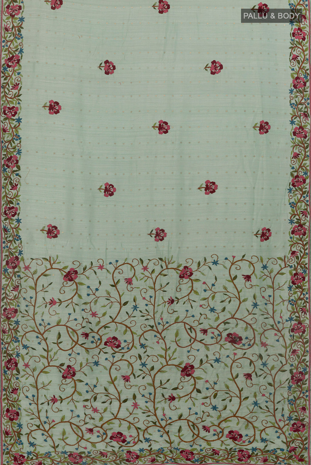 Flat view of Light Blue Tussar Saree with Embroidery on the body and Embroidery Border. 