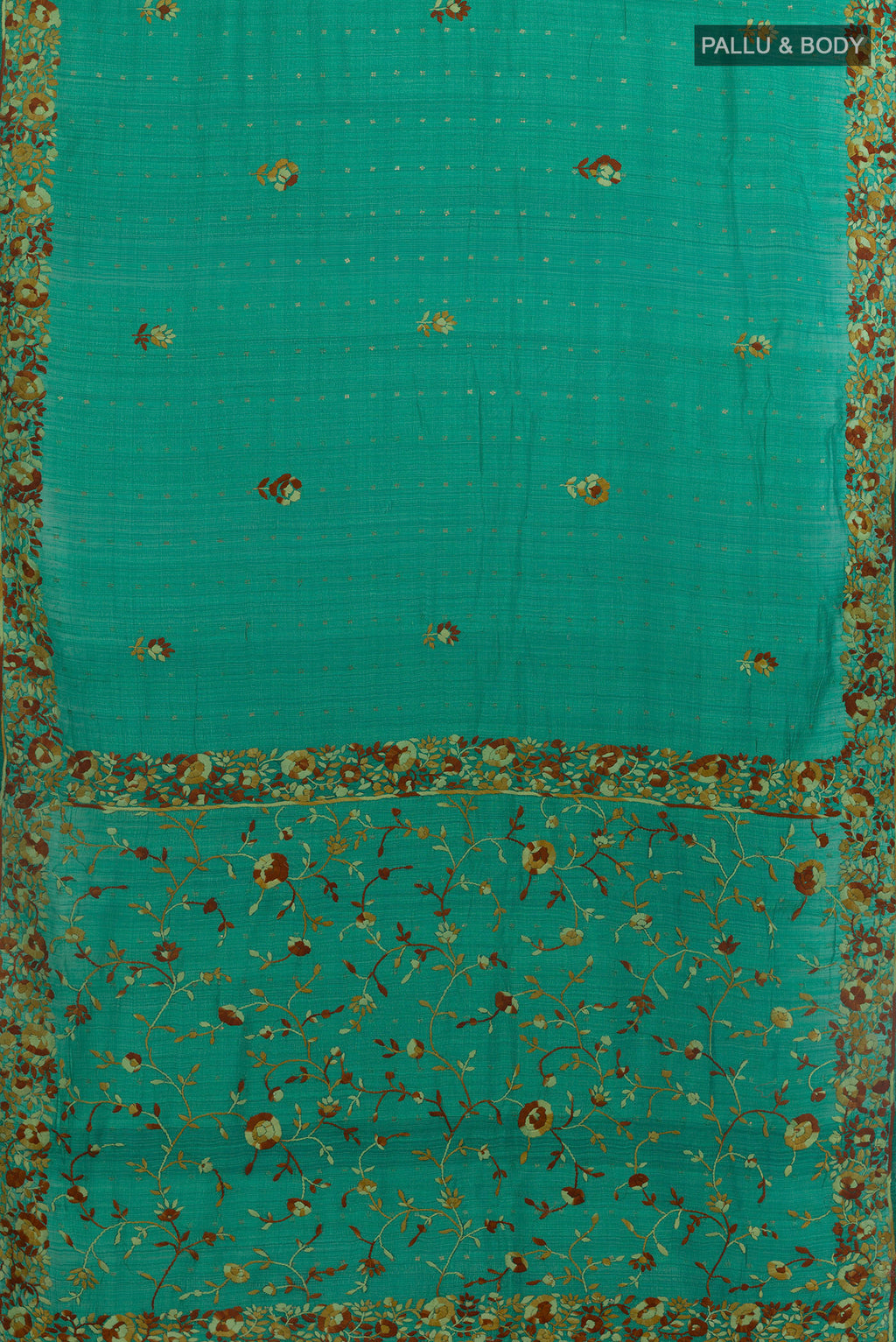 Flat view of Sea Green Tussar Saree with Embroidery on the body and Embroidery Border. 