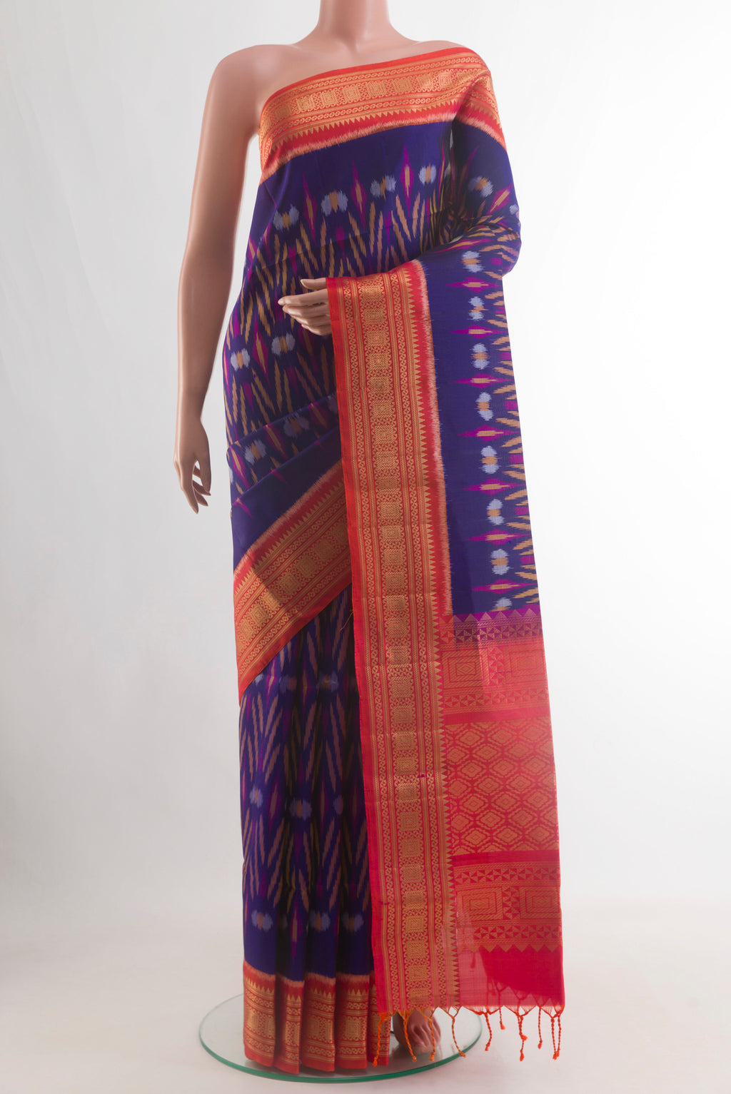 Pure Silk Blue Soft Saree with Ikat design on the body and Zari Border.  displayed on a mannequin