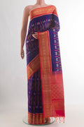Pure Silk Blue Soft Saree with Ikat design on the body and Zari Border.  displayed on a mannequin