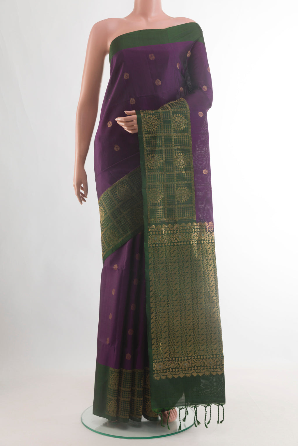 Pure Silk Purple Soft Saree with Zari Butta on the body and Zari Border.  displayed on a mannequin