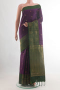Pure Silk Purple Soft Saree with Zari Butta on the body and Zari Border.  displayed on a mannequin