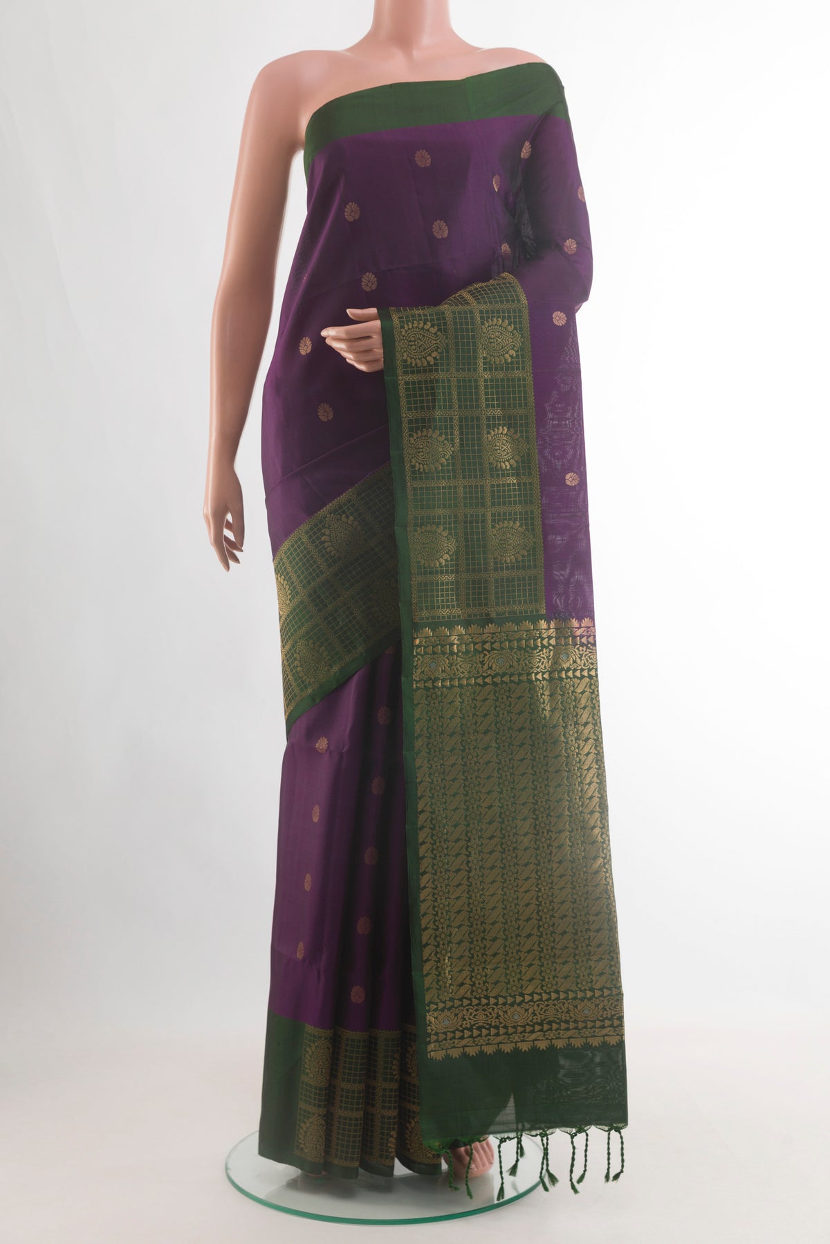 Pure Silk Purple Soft Saree with Zari Butta on the body and Zari Border.  displayed on a mannequin