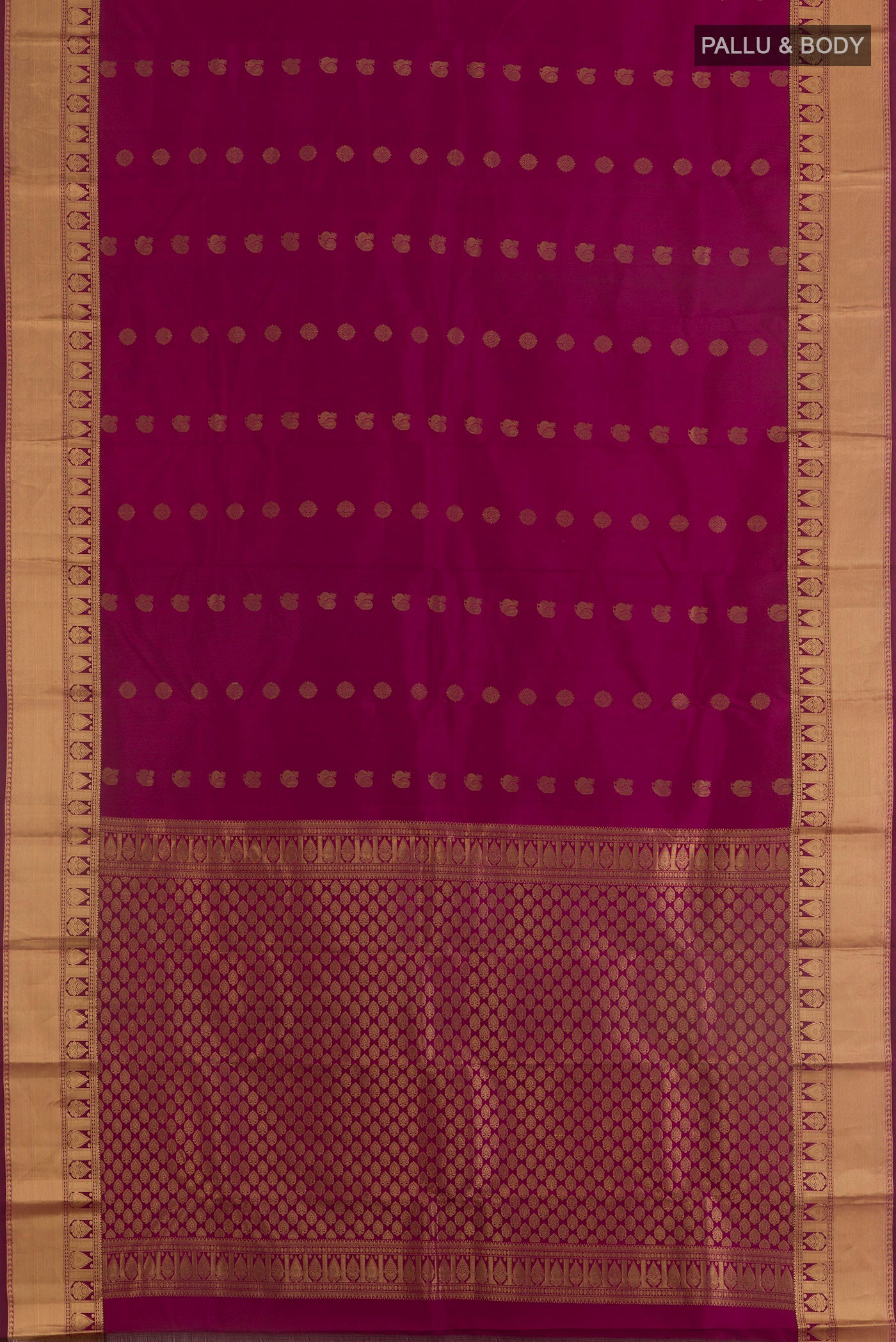Flat view of Pure Silk Magenta Kanjivaram Saree with Zari Butta on the body and Zari Border. 