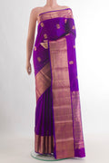 Pure Silk Purple Kanchipuram Saree with Zari Butta on the body and Zari Border.  displayed on a mannequin