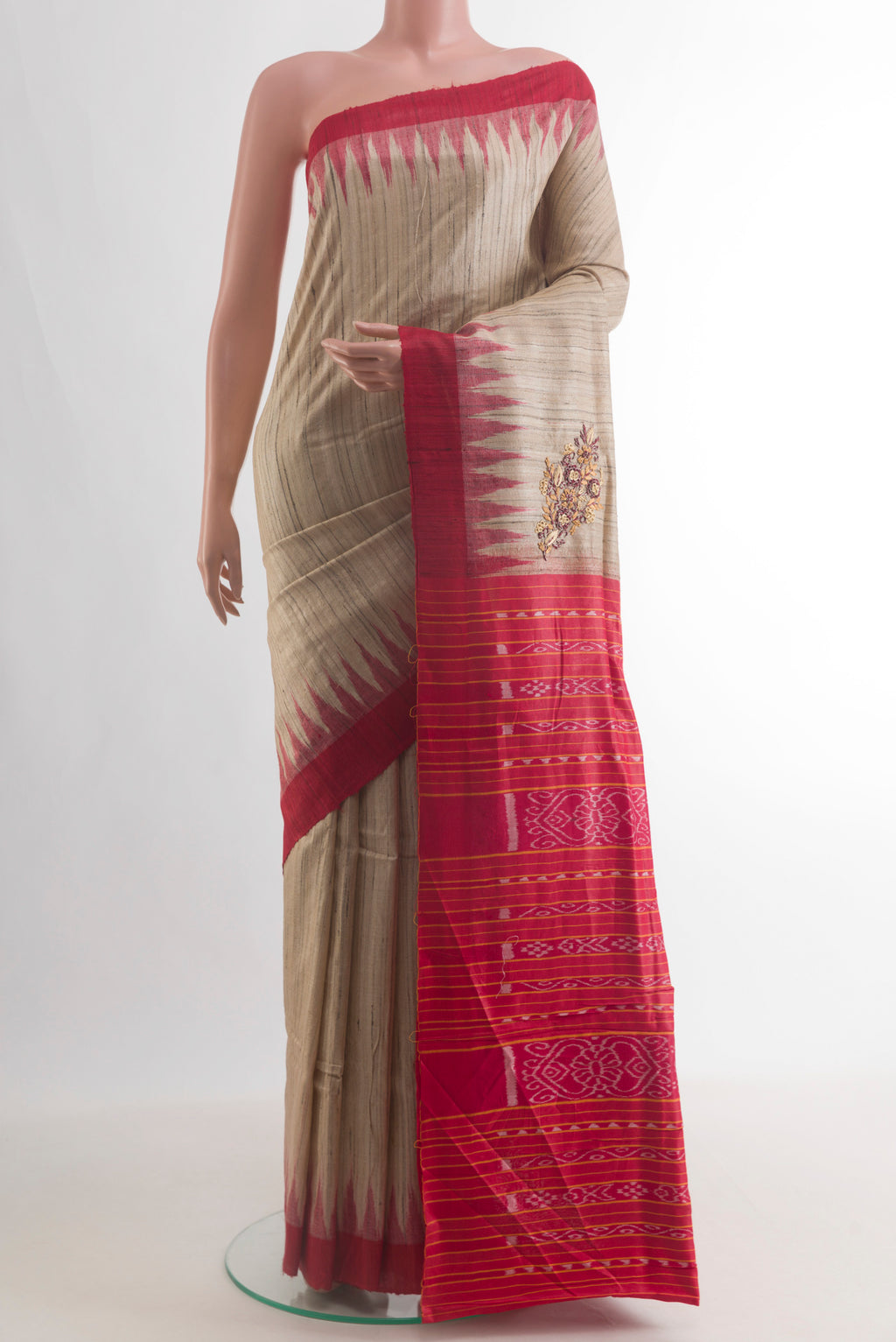 Beige Tussar Saree with Plain Body and Temple Border.  displayed on a mannequin