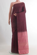 Pure Silk Brown Kanjivaram Saree with Stripes on the body and Thin Zari Line.  displayed on a mannequin