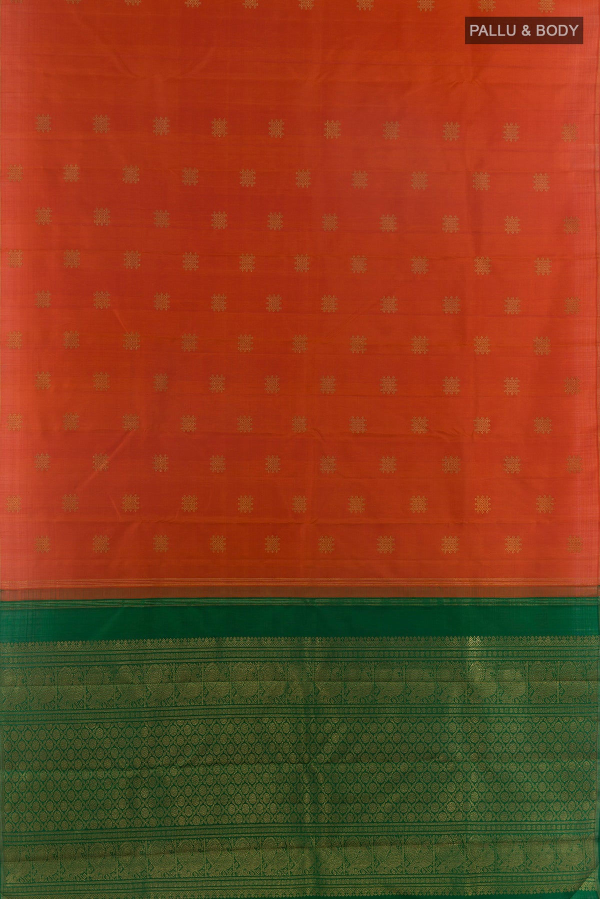 Flat view of Pure Silk Pure Zari Brick Orange Kanchipuram Saree with Zari Butta on the body and Zari Border. 