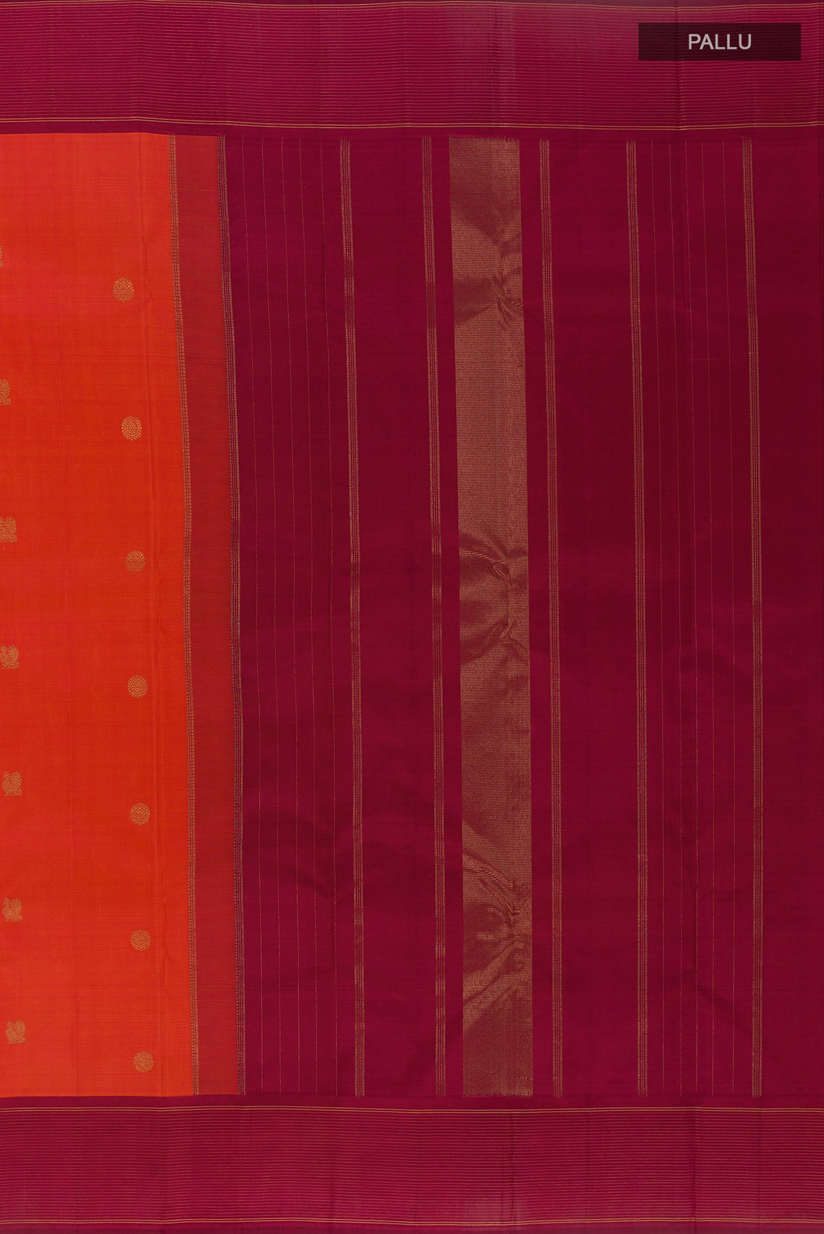 Close up image of the pallu of Pure Silk Orange Kanchipuram Saree with Zari Butta on the body and Plain Border. 