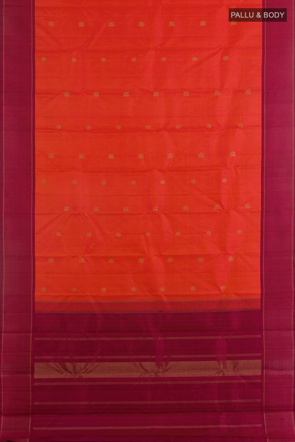 Flat view of Pure Silk Orange Kanchipuram Saree with Zari Butta on the body and Plain Border. 