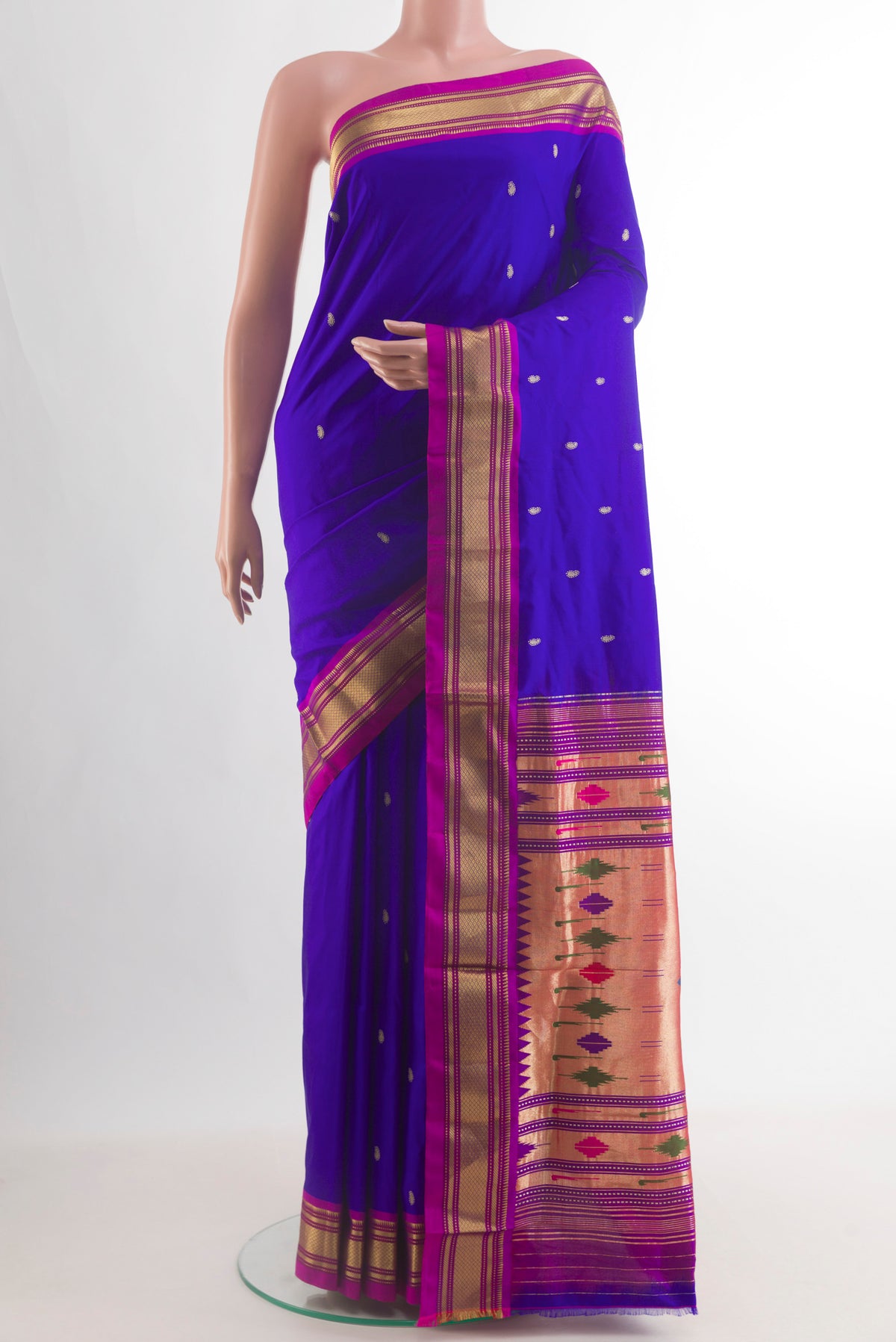 Pure Silk Blue Paithani Saree with Zari Butta on the body and Zari Border.  displayed on a mannequin
