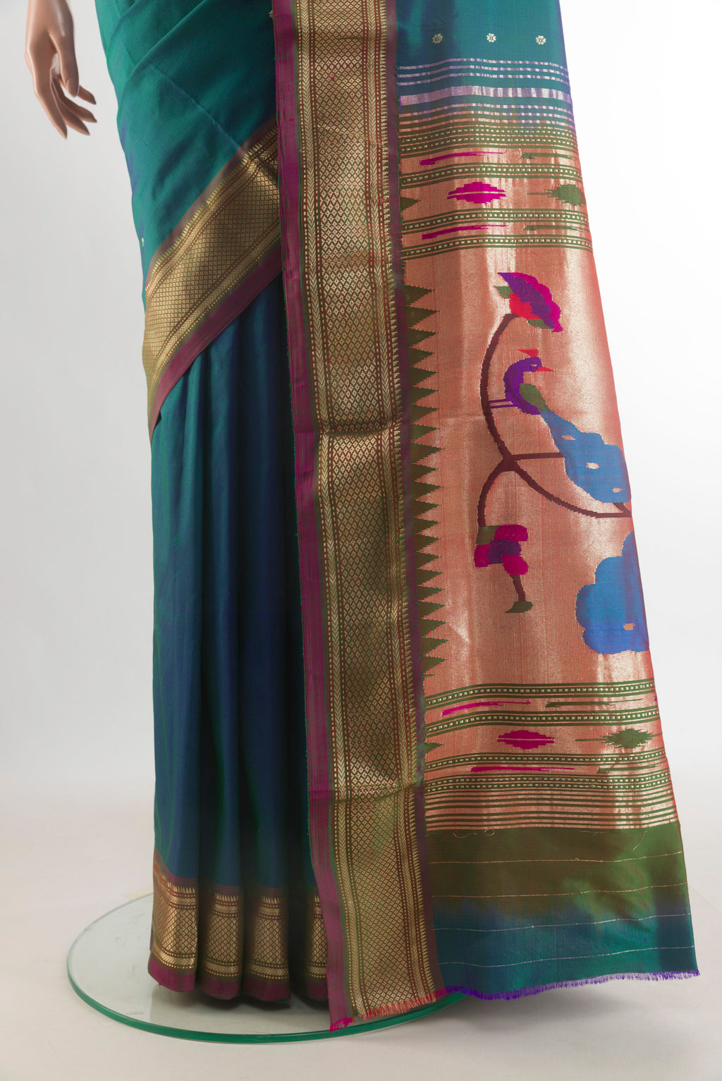 Pleats and pallu of Pure Silk Peacock Blue Dual Tone Paithani Saree with Zari Butta on the body and Zari Border. 