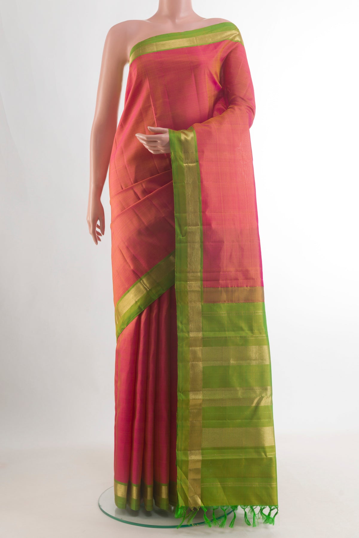 Pure Silk Pink Dual Tone Kanjivaram Saree with Plain Body and Zari Border.  displayed on a mannequin