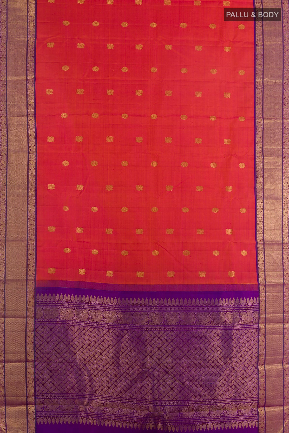 Flat view of Pure Silk Brick Orange Kanjivaram Saree with Zari Butta on the body and Zari Border. 