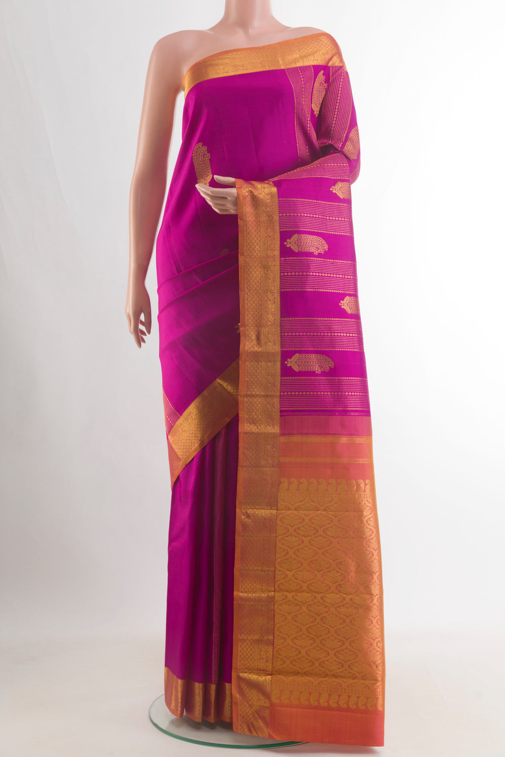 Pure Silk Light Magenta Kanjivaram Saree with Zari Butta on the body and Zari Border.  displayed on a mannequin