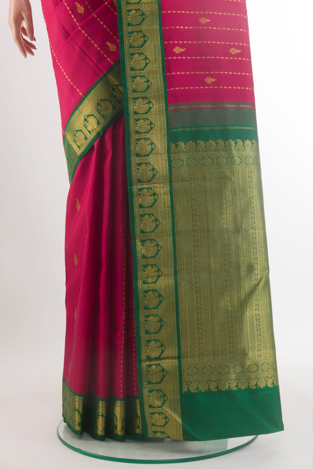 Pleats and pallu of Pure Silk Red Kanjivaram Saree with Zari Butta on the body and Zari Border. 