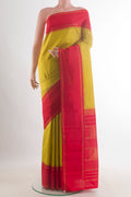 Pure Silk Light Green Kanjivaram Saree with Checked design on the body and Zari Border.  displayed on a mannequin