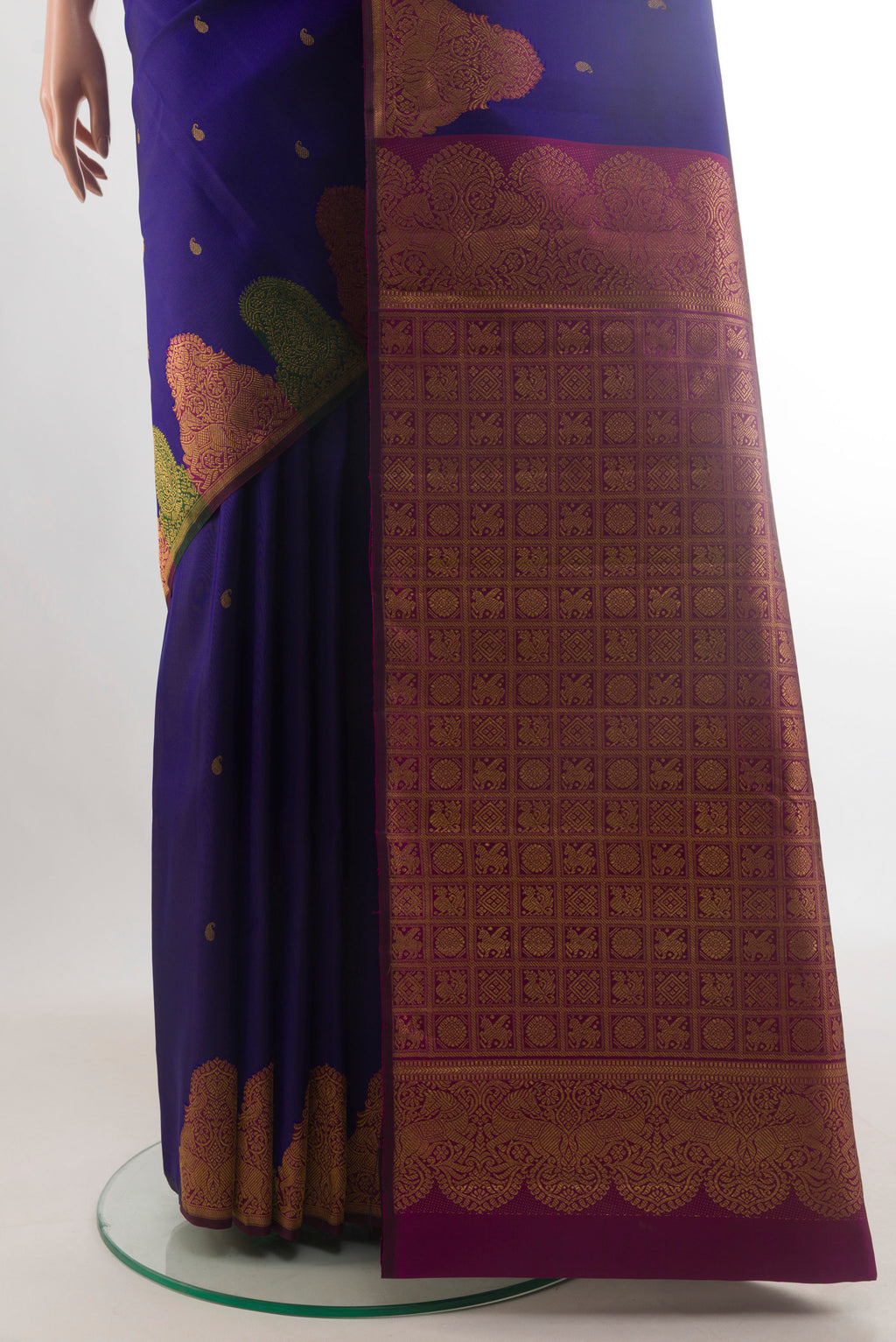 Pleats and pallu of Pure Silk Dark Blue Kanjivaram Saree with Zari Butta on the body and Fancy Border. 