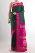 Pure Silk Green Kanjivaram Saree with Checked design on the body and Zari Border.  displayed on a mannequin