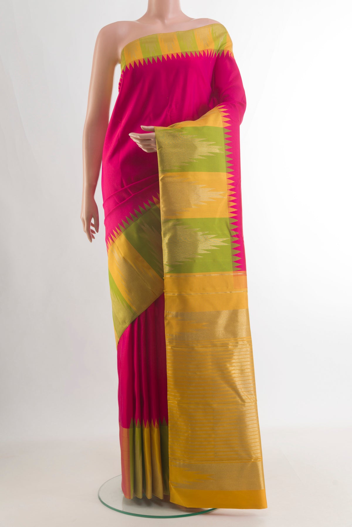 Pure Silk Pure Zari Pink Kanjivaram Saree with Plain Body and Temple Border.  displayed on a mannequin