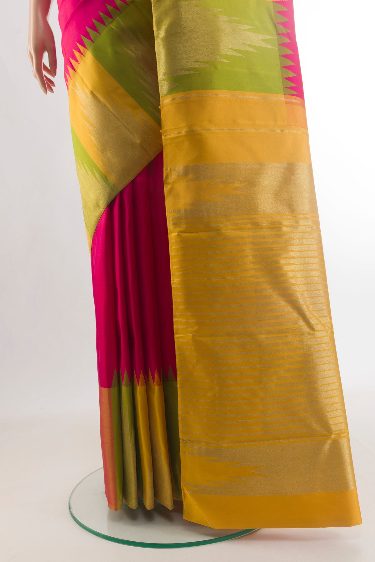 Pleats and pallu of Pure Silk Pure Zari Pink Kanjivaram Saree with Plain Body and Temple Border. 