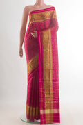 Pure Silk Pink Rajkot Patola Saree with Pure Ikat on the body and Ikat Border.  displayed on a mannequin