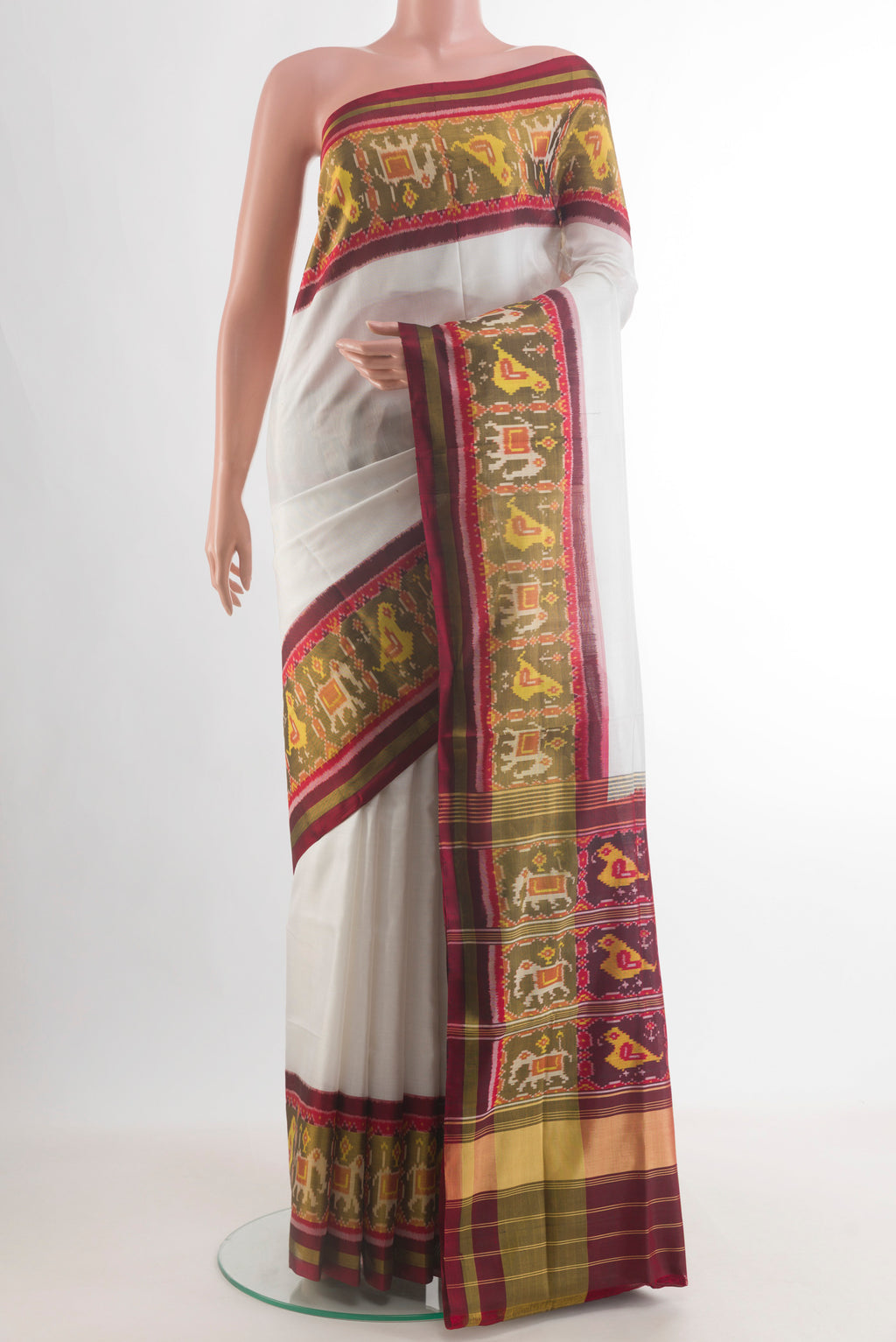 Pure Silk Off White Rajkot Patola Saree with Plain Body and Ikat Border.  displayed on a mannequin
