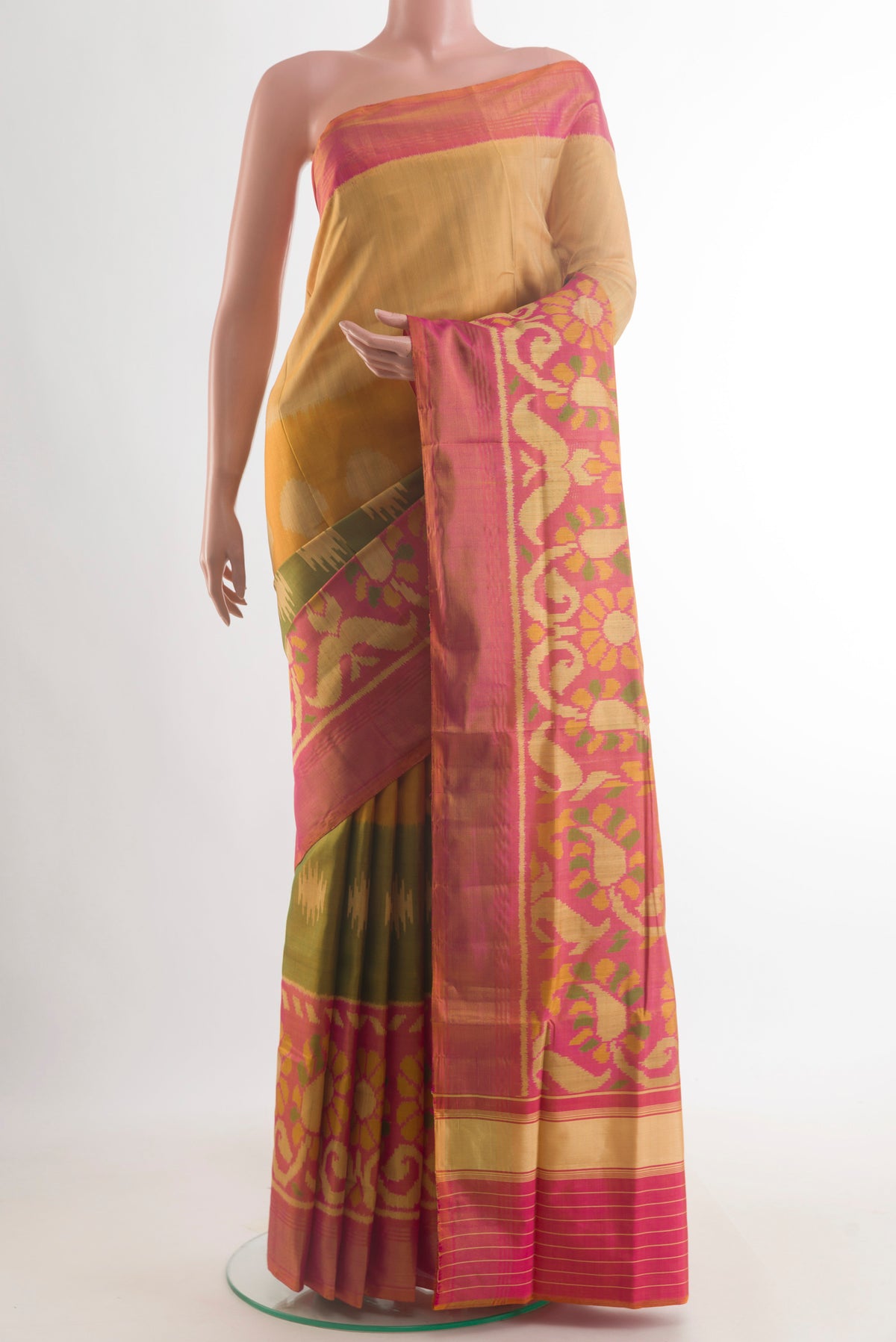 Pure Silk Multi Color Rajkot Patola Saree with Pure Ikat on the body and Ikat Border.  displayed on a mannequin