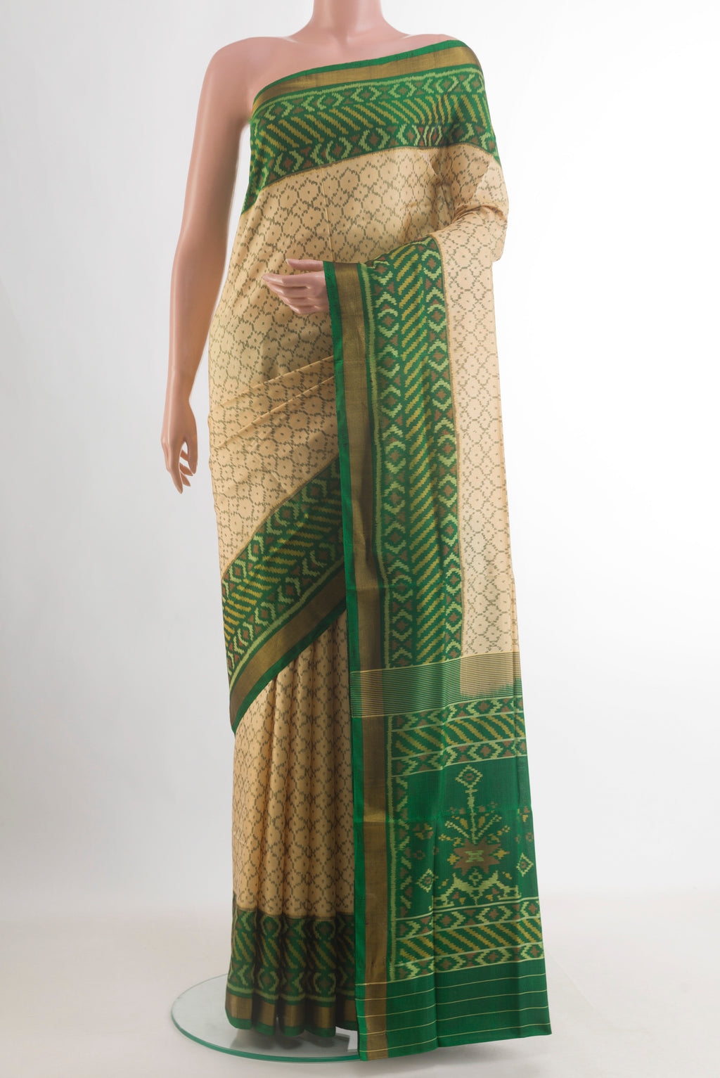 Pure Silk Sandal Rajkot Patola Saree with Pure Ikat on the body and Ikat Border.  displayed on a mannequin