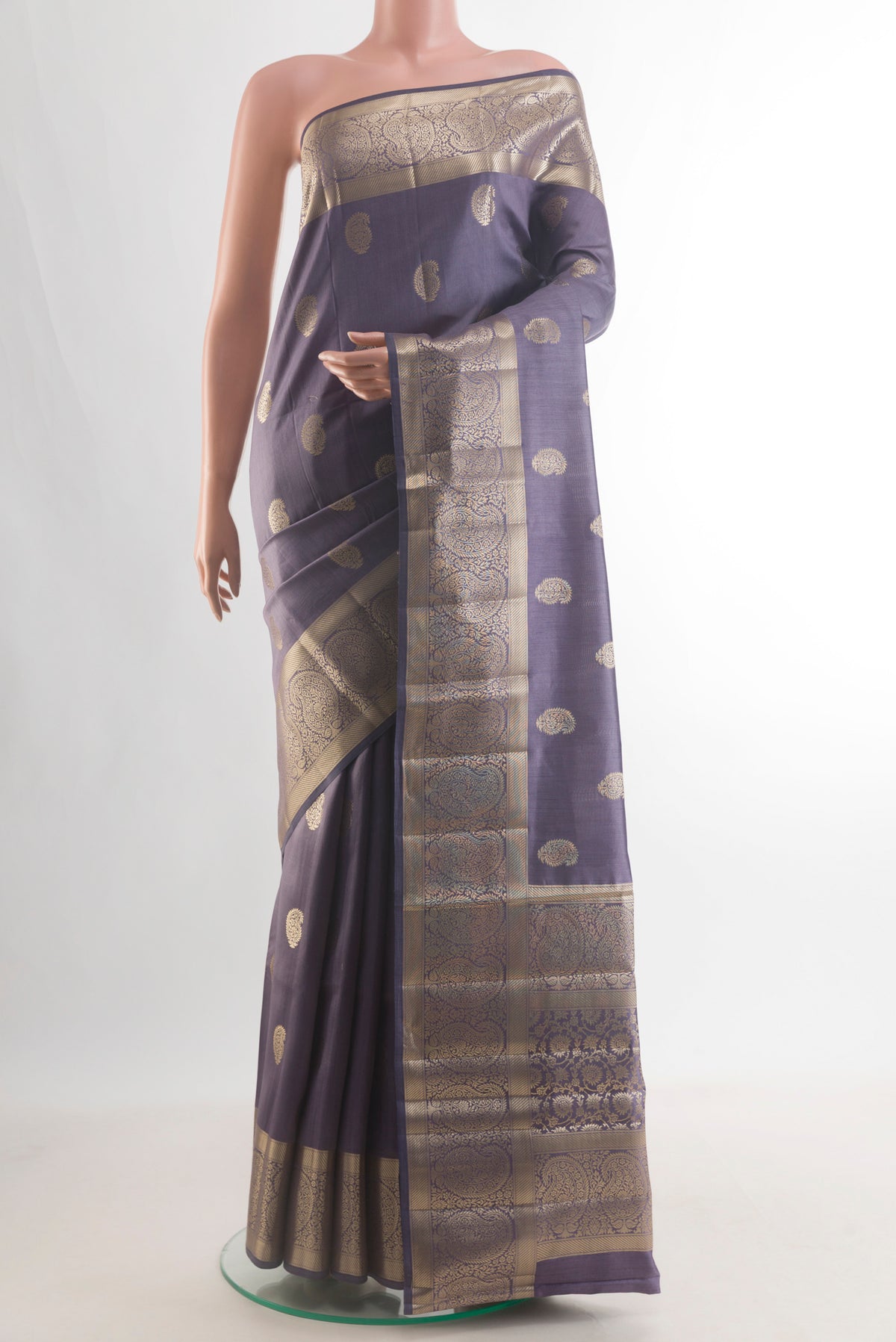 Pure Silk Davys Grey Banarasi Raw Saree with Zari Butta on the body and Zari Border.  displayed on a mannequin