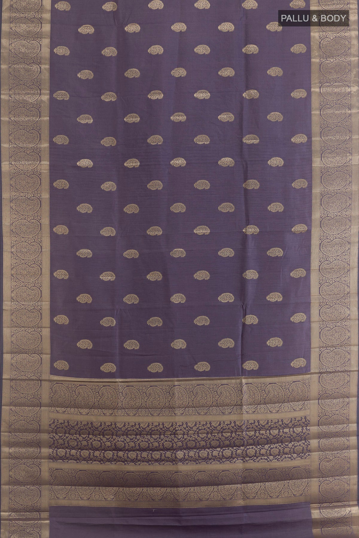 Flat view of Pure Silk Davys Grey Banarasi Raw Saree with Zari Butta on the body and Zari Border. 