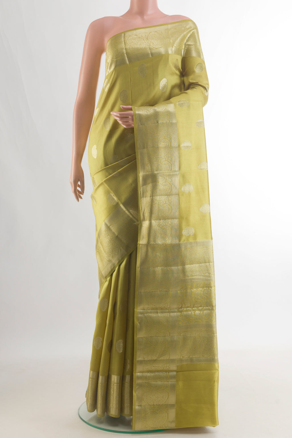 Pure Silk Lemon Yellow Banarasi Raw Saree with Zari Butta on the body and Zari Border.  displayed on a mannequin