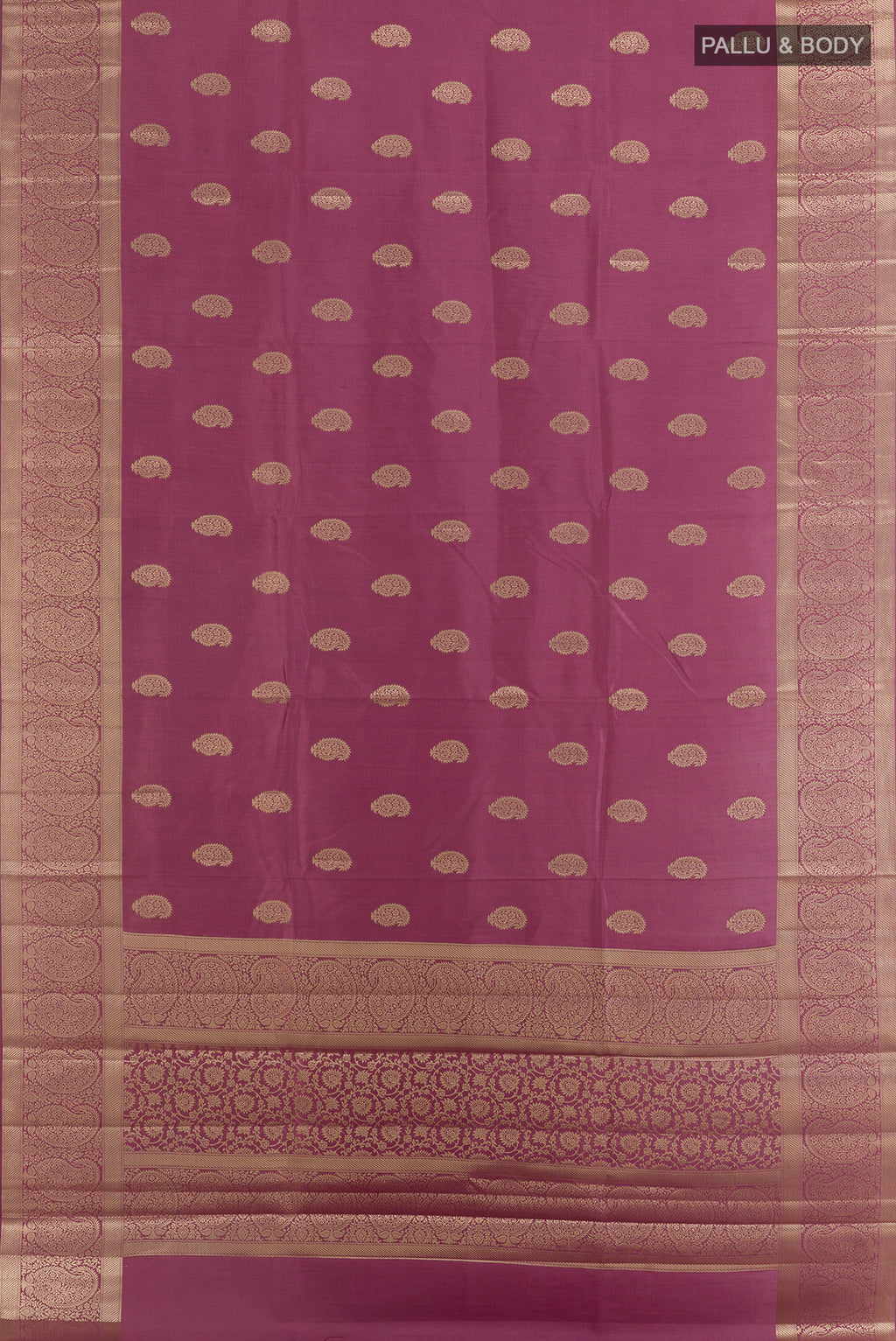 Flat view of Pure Silk Mauve Banarasi Raw Saree with Zari Butta on the body and Zari Border. 