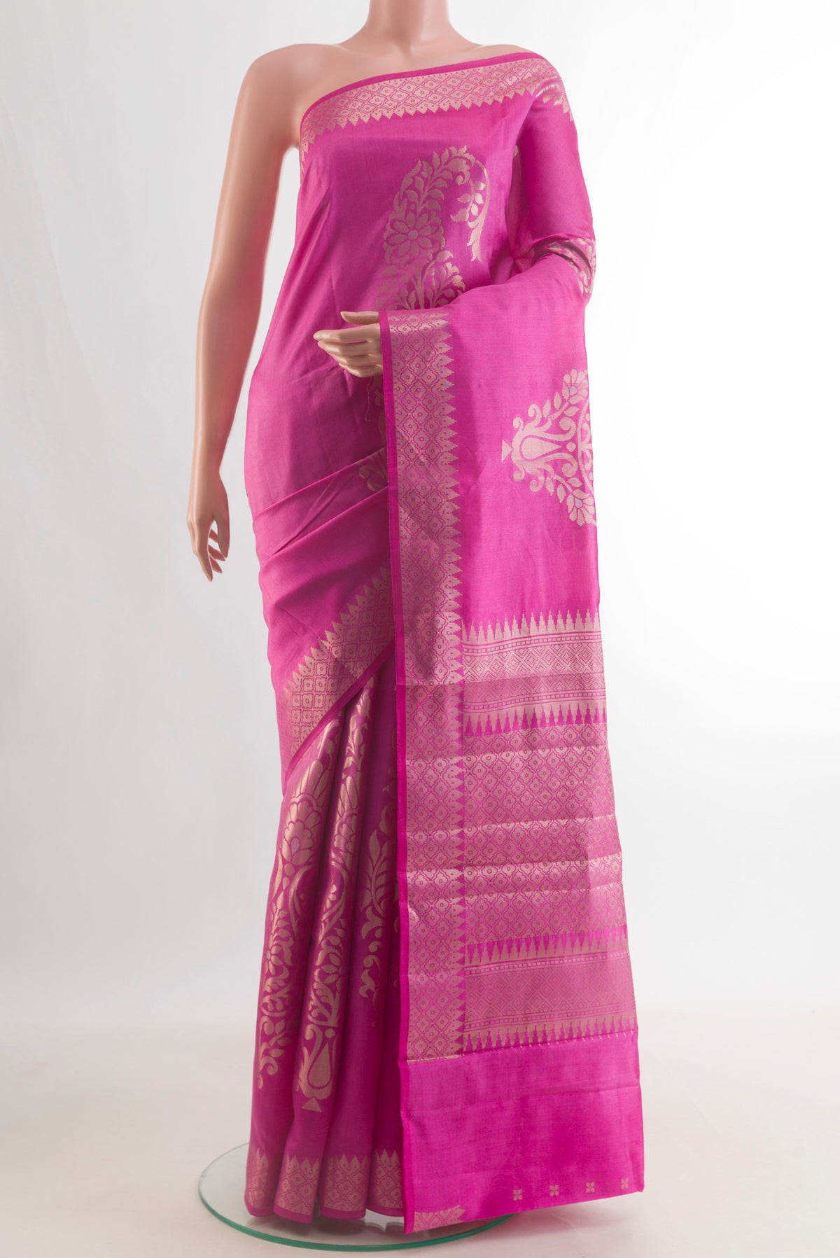 Pure Silk Pink Banarasi Raw Saree with Zari Butta on the body and Zari Border.  displayed on a mannequin
